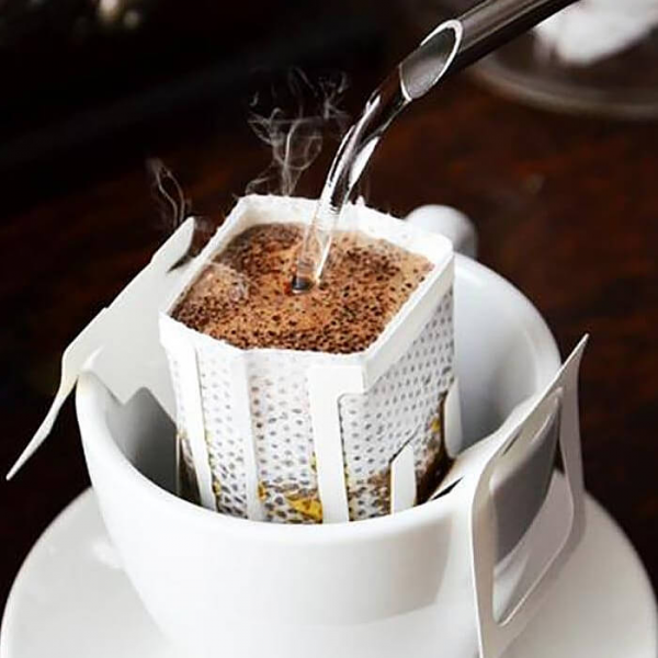 На фото изображено Кофе Бразилия Сантос в дрип-пакете