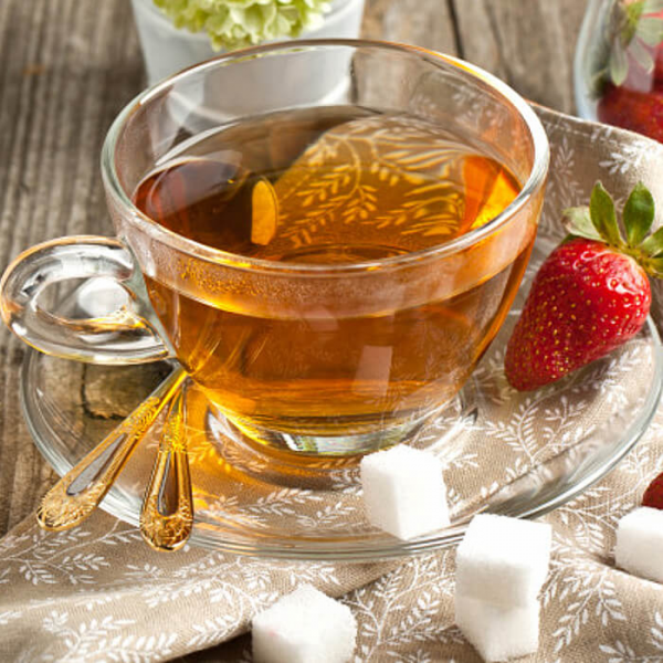 На фото изображено Чай Клубника со сливками сенча