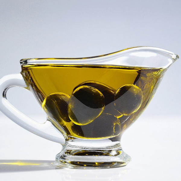 На фото изображено Оливки с косточкой вяленые "трубес" в оливковом масле , 150г